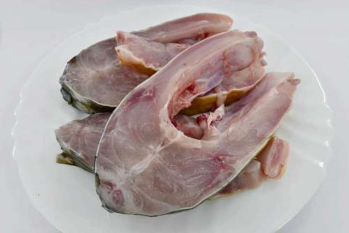 seafood salmon meat fillet seafood bone raw delicious dinner plate