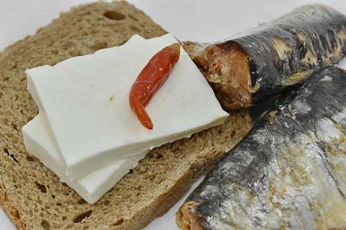 pepperoni sandwich pepperoni saltwater meal bread cheese fish toast sardines snack