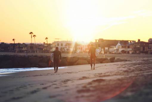 surfer sea  ocean  water  waves  nature  sunset  sunrise