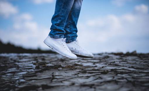 sneakers white  shoe  sneakers  land  jump  jeans
