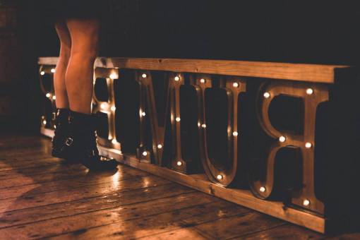 knees people  woman  boots  lights  text  feet  knee