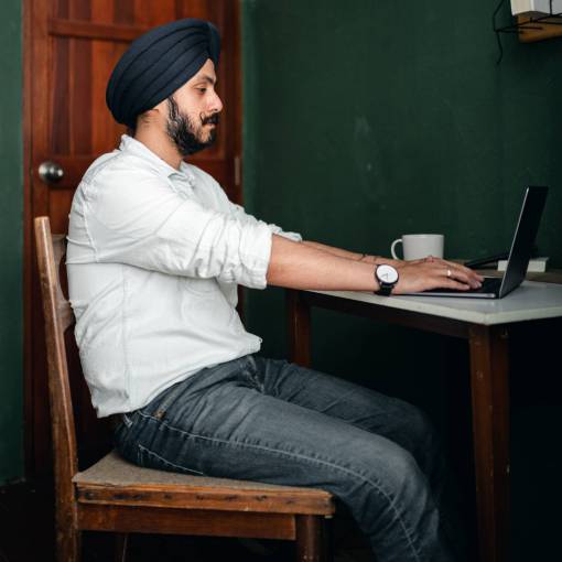 technology Man in a cafe working with his laptop