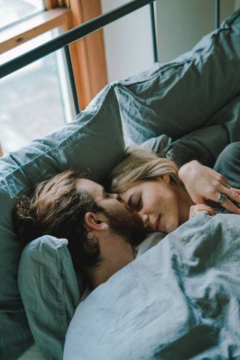 love Young couple sleeping embraced
