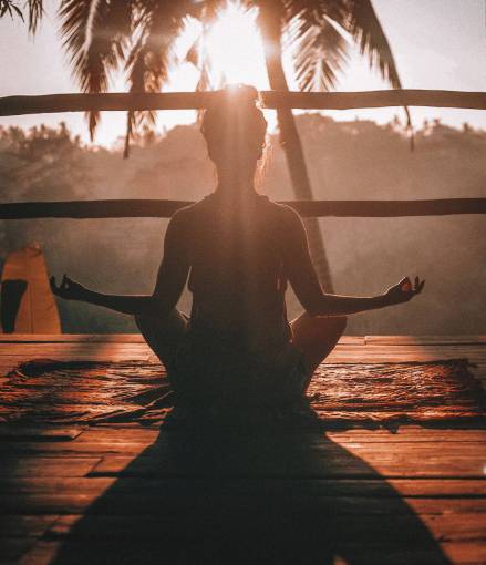 sunset meditating lifestyles relaxation woman;meditation men yoga