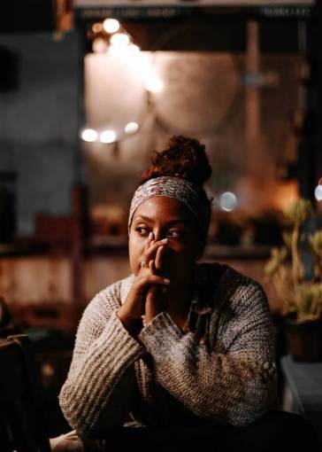 sweater woman;sweater;afroamerican women young adult adult african ethnicity indoors one person