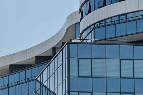 edificio oficina futurista contemporáneo ventana de vidrio moderno urbano curva kb