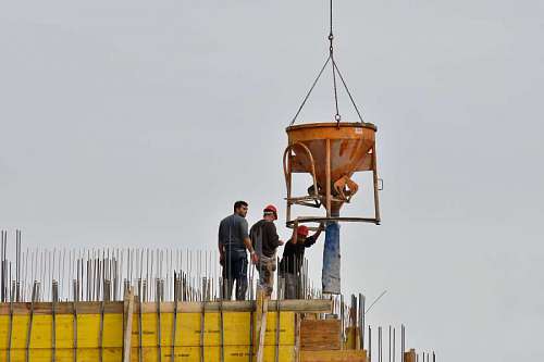 construction danger worker workers concrete building workman crane industry working industrial