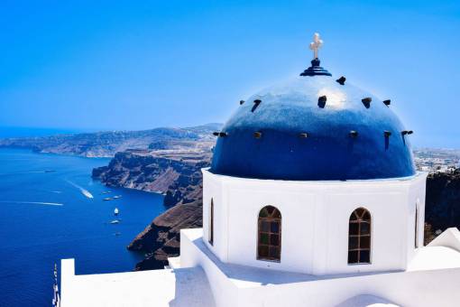 meditating Blue dome in Oia. Santorini, Greece