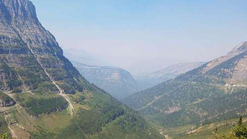 alpine alpine valley yellow mountain land greenish foliage mountains range landscape nature