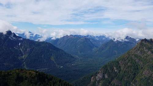 altitude altitude  cloudy  mist  mountain peak  slope 