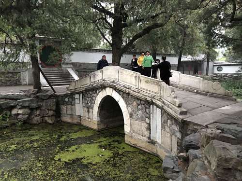 cementery architecture water tourist tourism bridge stone china cemetery river tree