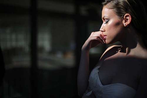 magnification businesswoman confidence elegance posing side lipstick cosmetics gorgeous makeup