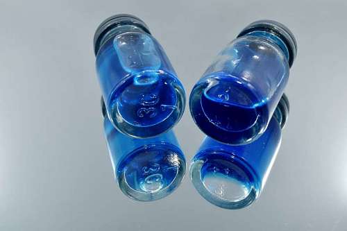 chemistry chemicals biochemistry plastic glass wet bottle liquidity