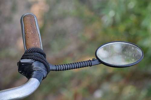 dirty material steering wheel bicycle metallic mirror outdoors equipment nature 
