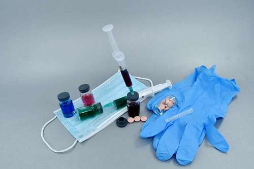 Guantes de ciencias de la salud medicina todavía equipos de investigación de tratamiento de jeringas de plástico