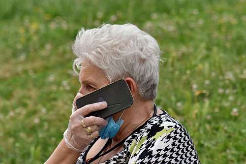 telecommunication mask face elderly phone grandmother portrait mobile gloves coronavirus telecommunication wireless woman