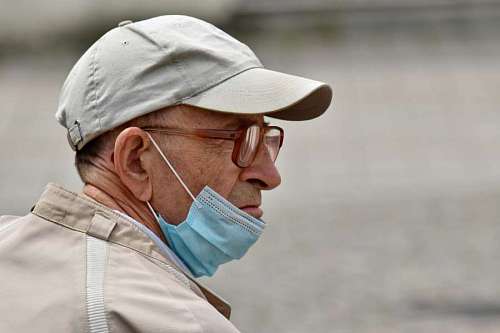refuse mask face eyeglasses eye medical side chin person portrait care wear properly disease ad elder using cloth less those refusing