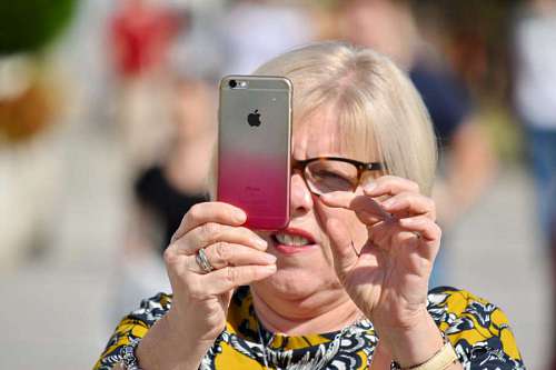 phone apple face blonde computer mobile woman finger telephone outdoors portrait kb