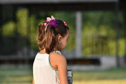 playground playful daycare playground child hairstyle accessory outdoors happy park