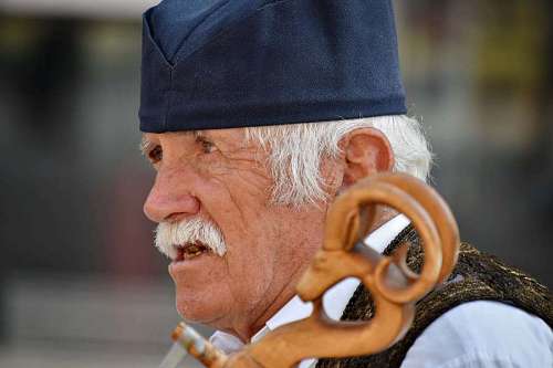 side portrait elderly musician street elder outdoors kb