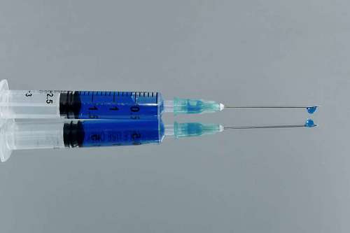 vaccine syringe needle healthcare injection medicine instrument close device science medication spritze medical injektion medicin  impfstoff grippe medizin gesundheitswesen