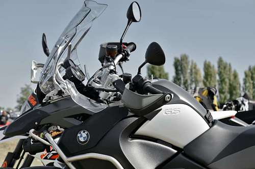 chrome windshield motorbike sunshine parking lot side  transportation competition chrome seat vehicle