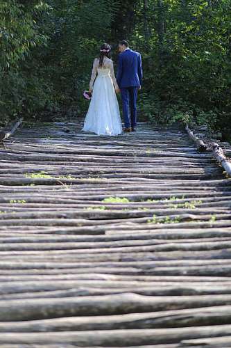 wooden  bridge  walking  groom  bride 