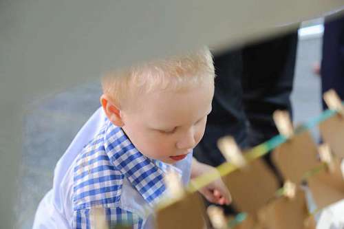 young boy blonde head face childhood kid child son 