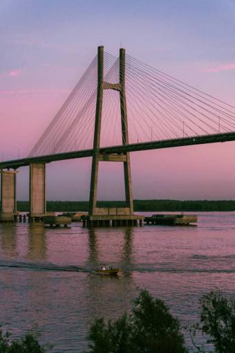 sunset Rosario Victoria Bridge in Rosario, Argentina ? Iconic Suspension Bridge Over the Paran? River
