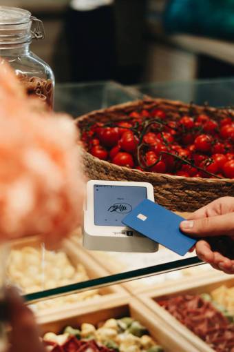 car Person Making a Contactless Payment with Credit Card
