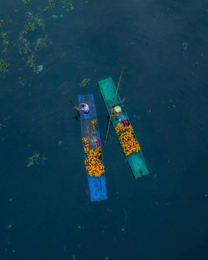 nature Two Women Sailing on Wooden Rafts in Mexico City – Aerial View