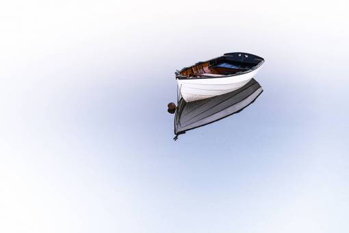 landscape Boat floating on a calm lake