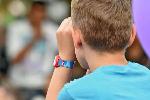 wristwatch boy arm attractive wristwatch person leisure competition outdoors child portrait 