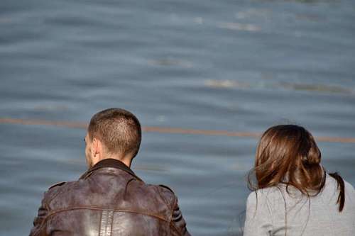 boyfriend boyfriend girlfriend enjoying water reflection lake togetherness relaxation portrait 