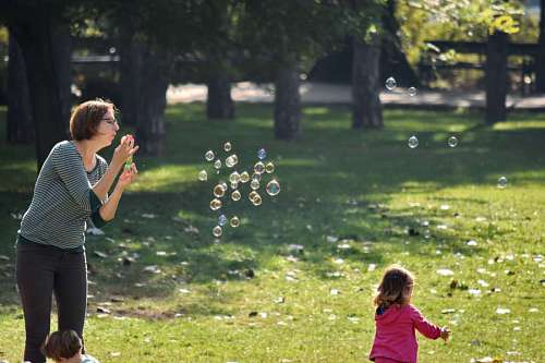 motherhood child outdoors park motherhood playful togetherness childhood grass kb