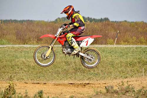 extreme motocross jump motorbike fast race danger  rider helmet