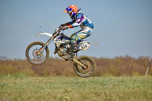 cyclist fast excitement motocross jump exhibition helmet cyclist extreme ride 