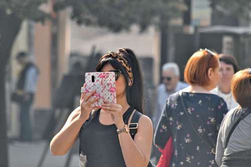hairstyle glamour gorgeous phone mobile woman urban portrait area young street