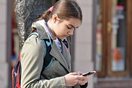 teenager mobile teenager phone student street woman young pretty portrait outdoors telecommunication urban scientists alarm covid sound computer app