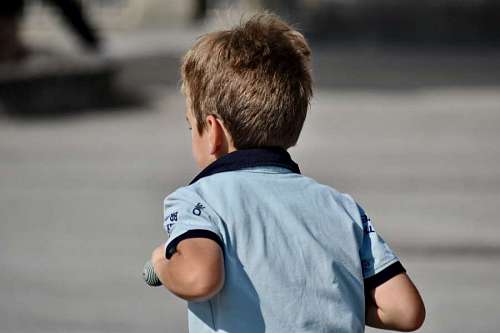 playful blur outdoors boy child portrait nature street