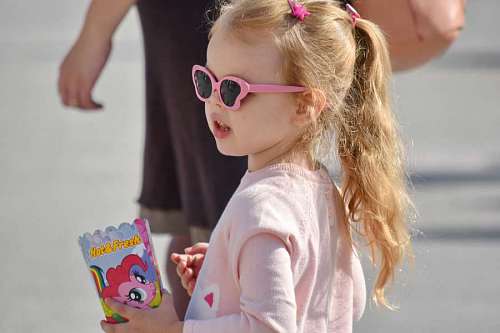 popcorn pretty blonde hair sunglasses popcorn innocence side child attractive portrait 