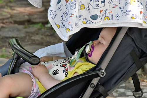 side childhood sleeping portrait child summer outdoors