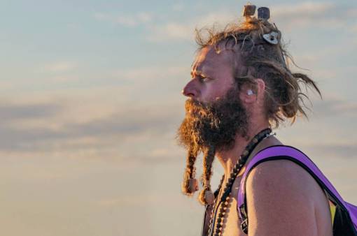 way Man with a long beard looking at the horizon