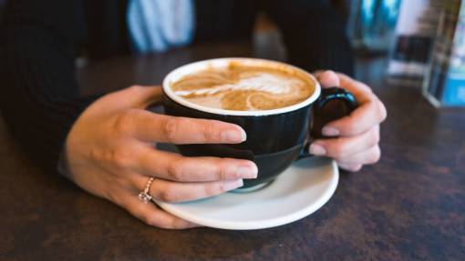 morning Woman holding coffee cup