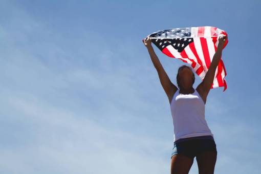 people American Flag on 4th of July Independence Day Celebration
