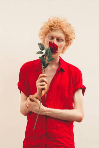love Man smelling a flower
