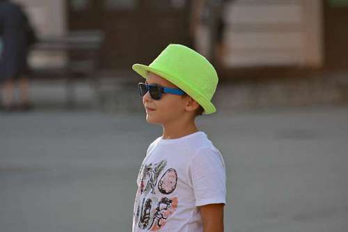 side-view enjoyment portrait hat boy side sunglasses child person street