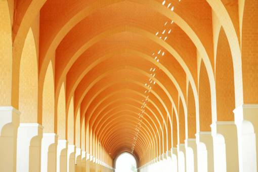 pattern Orange corridor with arches of Arab architecture