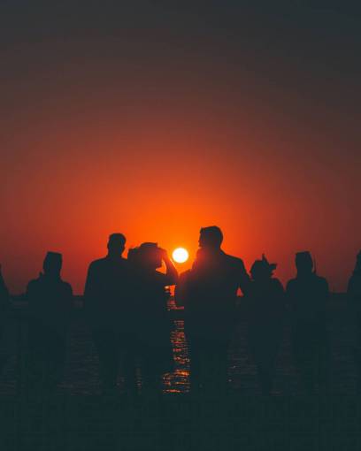 Beach party at sunset