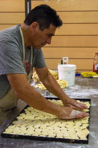 making-a-face Grease cookies in an Argentine bakery
